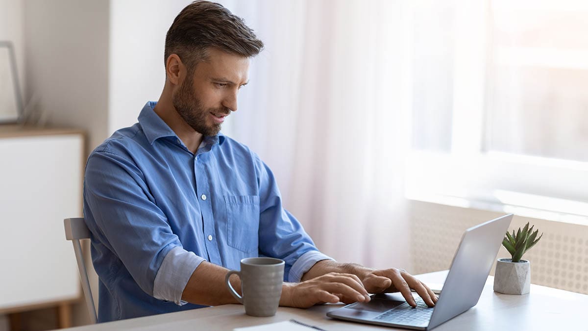 website-design-northwest-indiana-blog-post-2021 Man updating his business website