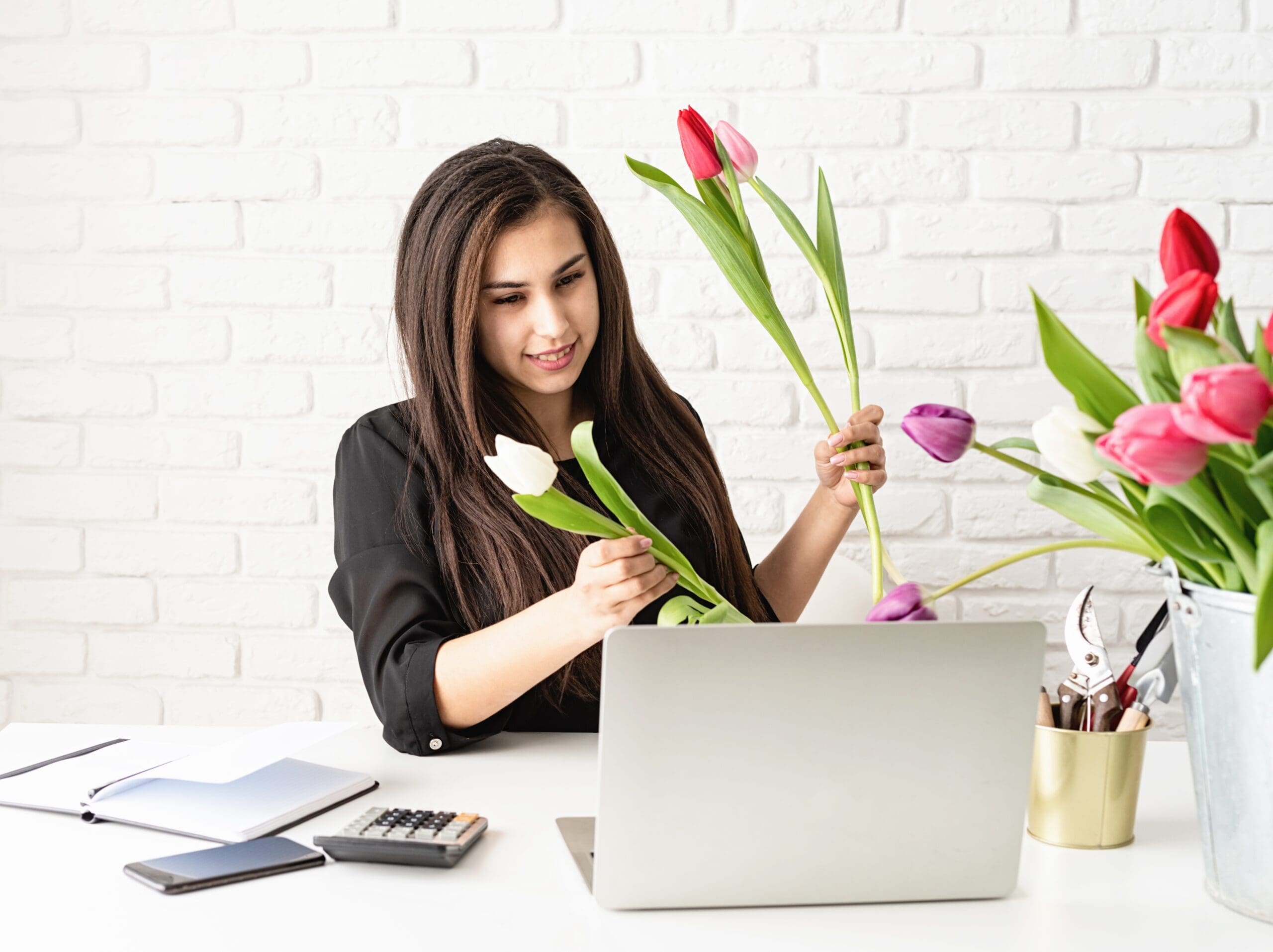 florist lady working with clients online