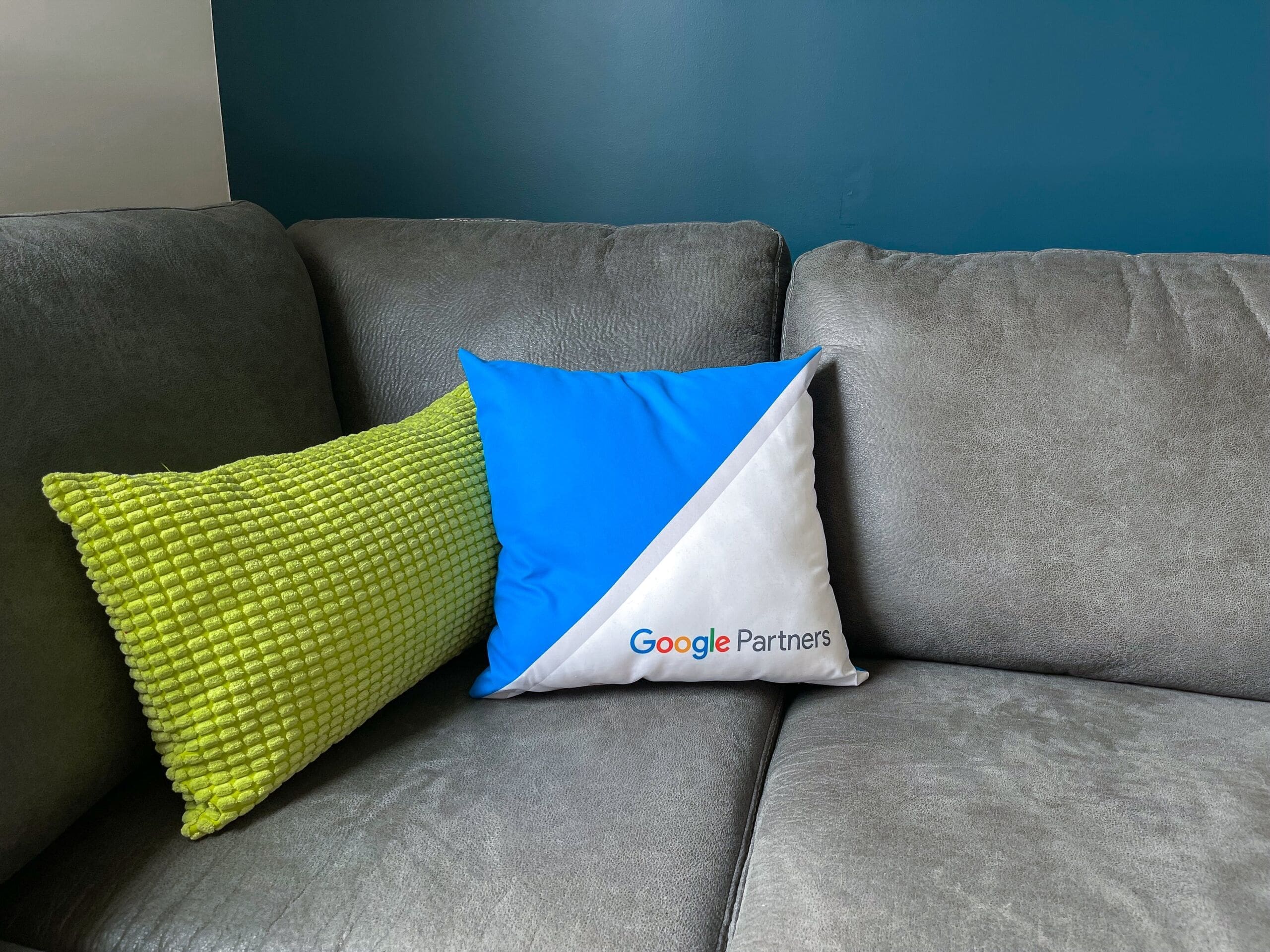 google partners pillow on sofa